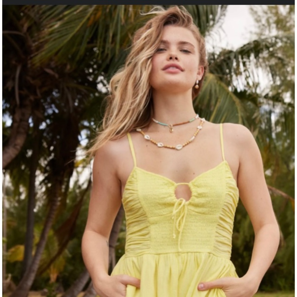 Aerie Keyhole soft yellow romper. NWT Large